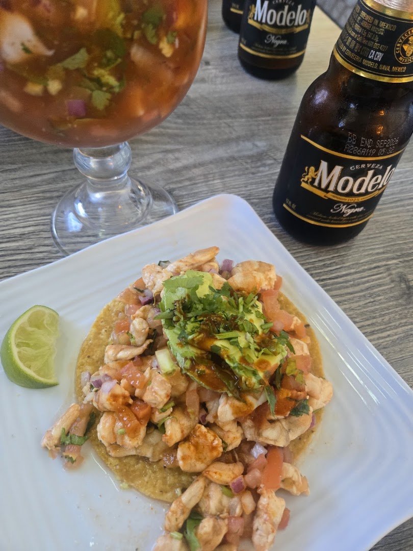 Seafood dishes on a casual restaurant table